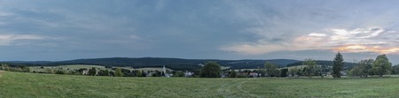 Horni Blatna town in dark cloudy summer eveningの写真素材