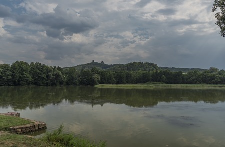 Trosky castle in summer hot day with Rokytnicky pondの写真素材