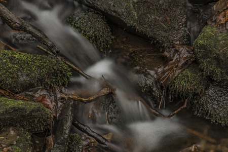 Prucelsky creek in winter cold cloudy day in Ceske Stredohori mountainsの写真素材