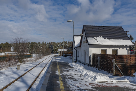 Vrabce station in south Bohemia with snow, sun and coldの写真素材