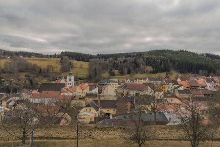 Vimperk town in Sumava national park in cloudy winter dark dayの写真素材
