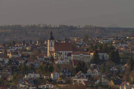 Rudolfov part of city of Budweis in sunset color evening with tower and churchの写真素材