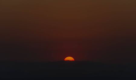 Red sun in sunset evening near Ceske Budejovice city in spring part of year