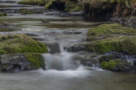 Lomna river in Trojanovice village in spring hot color dayの写真素材