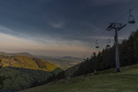 Color spring morning view from Pustevny in Beskydy fresh mountains with cable carの写真素材