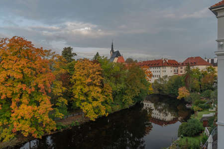 Cesky Krumlov old town with Vltava river and bridges in autumn color beautiful morning