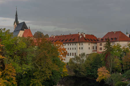 Cesky Krumlov old town with Vltava river and bridges in autumn color beautiful morning