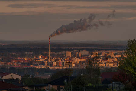 Big town Ceske Budejovice with sunny shine on block of flats and churches in autumn morningの写真素材