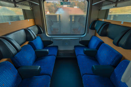 Blue seat compartment in fast expres train in Czech republic from Linz to Pragueの写真素材