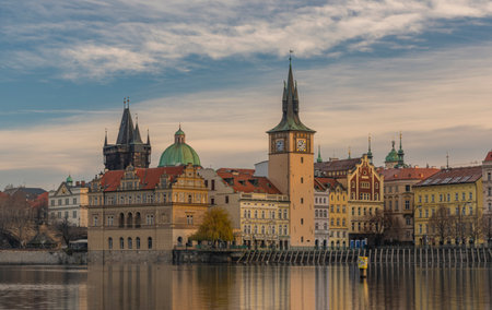 Prague from island on river Vltava near old bridges and towers in autumn sunny color morningの写真素材