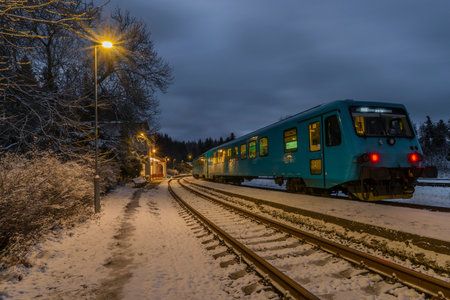 Winter snowy railway station Jedlova in the middle of Luzicke hory in frosty morningの写真素材