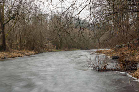 Malse river with melting of snow in south Bohemia mountains in cold winter dayの写真素材