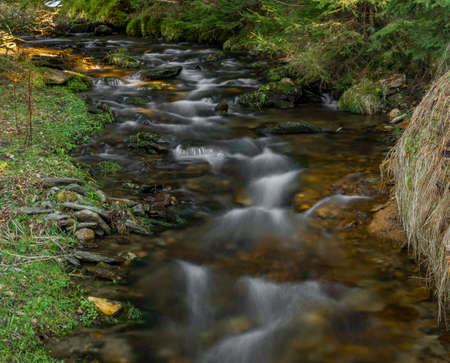 Uhlava river near Spicak hill with wooden bridge and spring fresh clean water