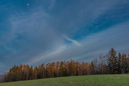 Sunset view in Roprachtice village in Krkonose mountains in spring beautiful eveningの写真素材