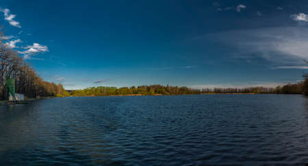Nadeje pond near Hluboka nad Vltavou town in spring color dark blue eveningの写真素材