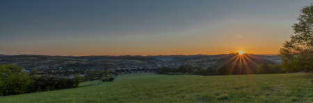 Vizovice town with sunrise of orange sun and fresh color air in east Moraviaの写真素材