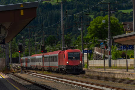 Germany train in Austria mountains in Sankt Johann im Pongau in summer sunny day