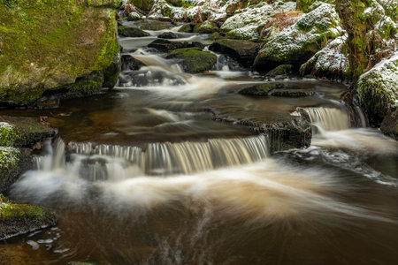 Branka waterfall on Mze river near Branka village in west Bohemia in winter dayの写真素材