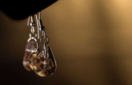 Handmade small color nice earring with nice backgroundの写真素材