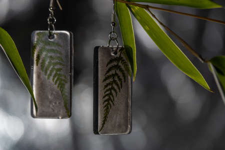 Handmade small color nice earring with nice backgroundの写真素材