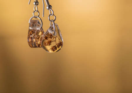 Handmade small color nice earring with nice backgroundの写真素材