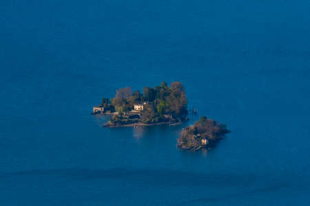 Cardada panoramic view over Maggiore blue lake in spring sunny blue morning