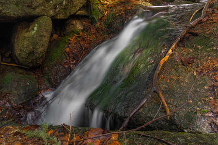 Cerveny creek with Cerveny waterfall in Jizera mountains in spring fresh color morning