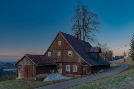 Spring sunny frosty morning in Paseky nad Jizerou village in Krkonose mountainsの写真素材