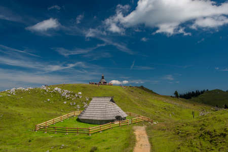 Beautiful blue sky summer day in Velika Planina mountains in color Sloveniaの写真素材