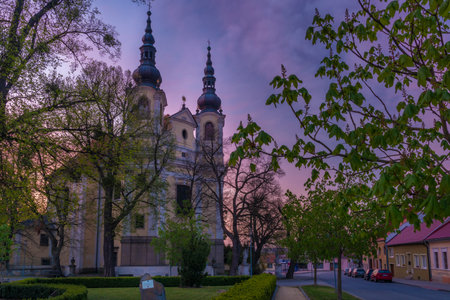 Church in Kvasice village in central Moravia before color sunriseの写真素材