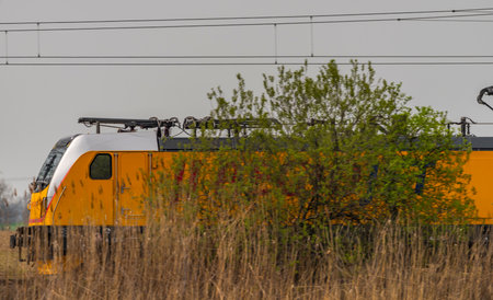 Trains near Ostrava city in spring fresh color cloudy day