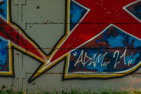 Graffiti with blue and red star on white old concrete wall in Rakovnik townのeditorial素材
