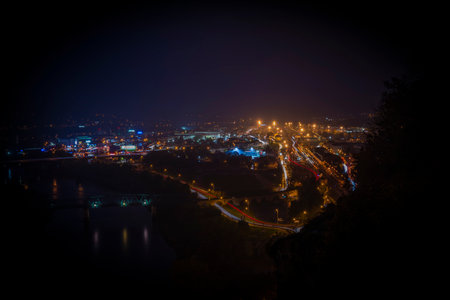 Decin town from above in dark mist evening in fresh autumnの写真素材