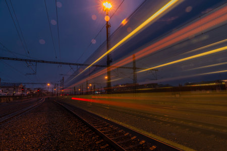 View on Prague Liben railway station in wet rainy evening