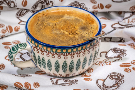 Dish coffee towel with cup and spoon and coffee with sugar and dry milkの写真素材