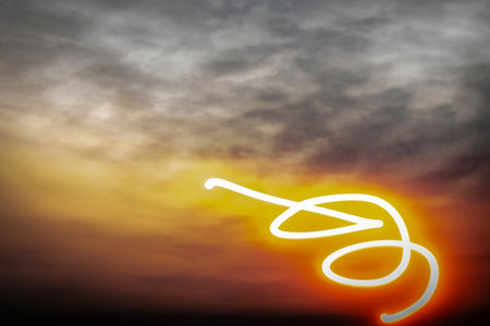 Twisted lines on evening sky after color beautiful sunsetの写真素材