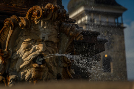 Historc old fountain with sunset light in summer hot beautiful eveningの写真素材