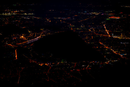 Night view from Gaisberg hill over Salzburg city in summer fresh hot eveningの写真素材