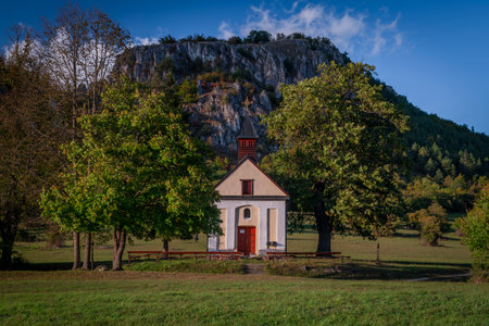 Chapel near Podskalie village in autumn color evening in Strazovske hillsの写真素材