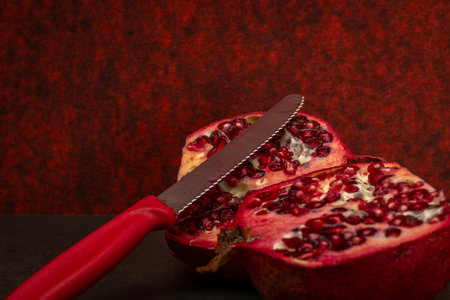 Fresh pomegranate with red background