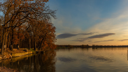 Vysatov pond with sunset color light in autumn sunny evening in south Bohemiaの写真素材