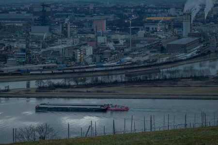 Blue hour cloudy winter view from hill for city and factories in Linz Austria 02 28 2025の写真素材