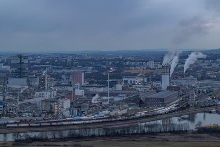Blue hour cloudy winter view from hill for city and factories in Linz Austria 02 28 2025の写真素材