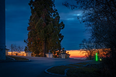 Orange sunrise with blue hour colors near valley of river in Austriaの写真素材