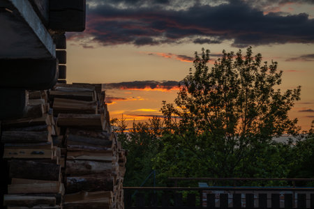 Spring fresh sunset view for wooden house on hill Svatobor in south west Bohemiaの写真素材