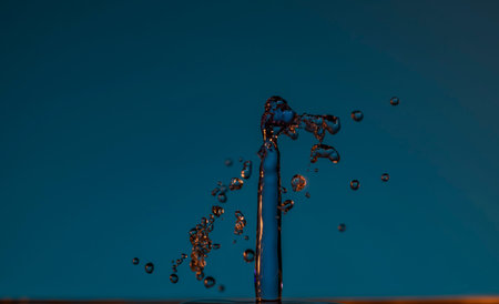 Color drops splash in fresh clean water