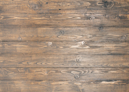 background of textured teak-coloured rough-finished pine planksの写真素材