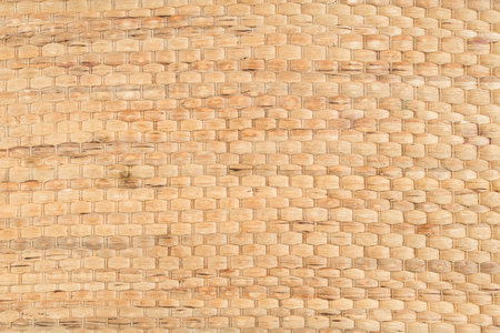 texture of woven cane stems in yellow color