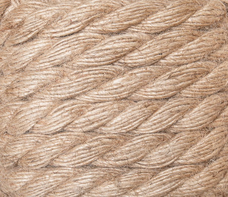 Texture of beige thick jute ropes with pile