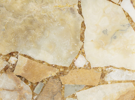 Bright stone high contrast background from pressed fragments of pink and white marbleの写真素材